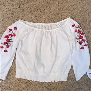 white w/ roses cropped off the shoulder shirt